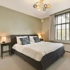 Art Deco plafondlamp goud met smoke en amber glas><noscript><img width=