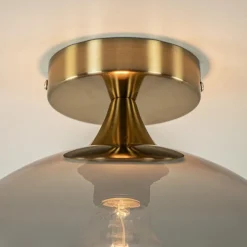 Chique plafondlamp goud met smoke/titanium glazen bol></noscript>Straluma Best