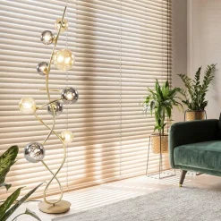 Chique vloerlamp goud met smoke en amber glazen bollen></noscript>Straluma