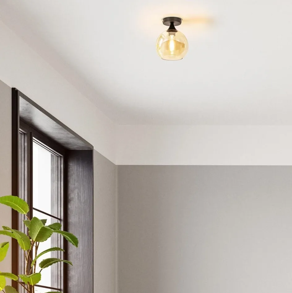Kleine plafondlamp zwart met amber glazen bol>Straluma Best
