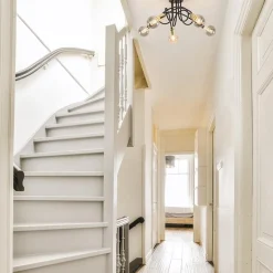 Retro plafondlamp zwart met gouden pendels></noscript>Straluma Hot