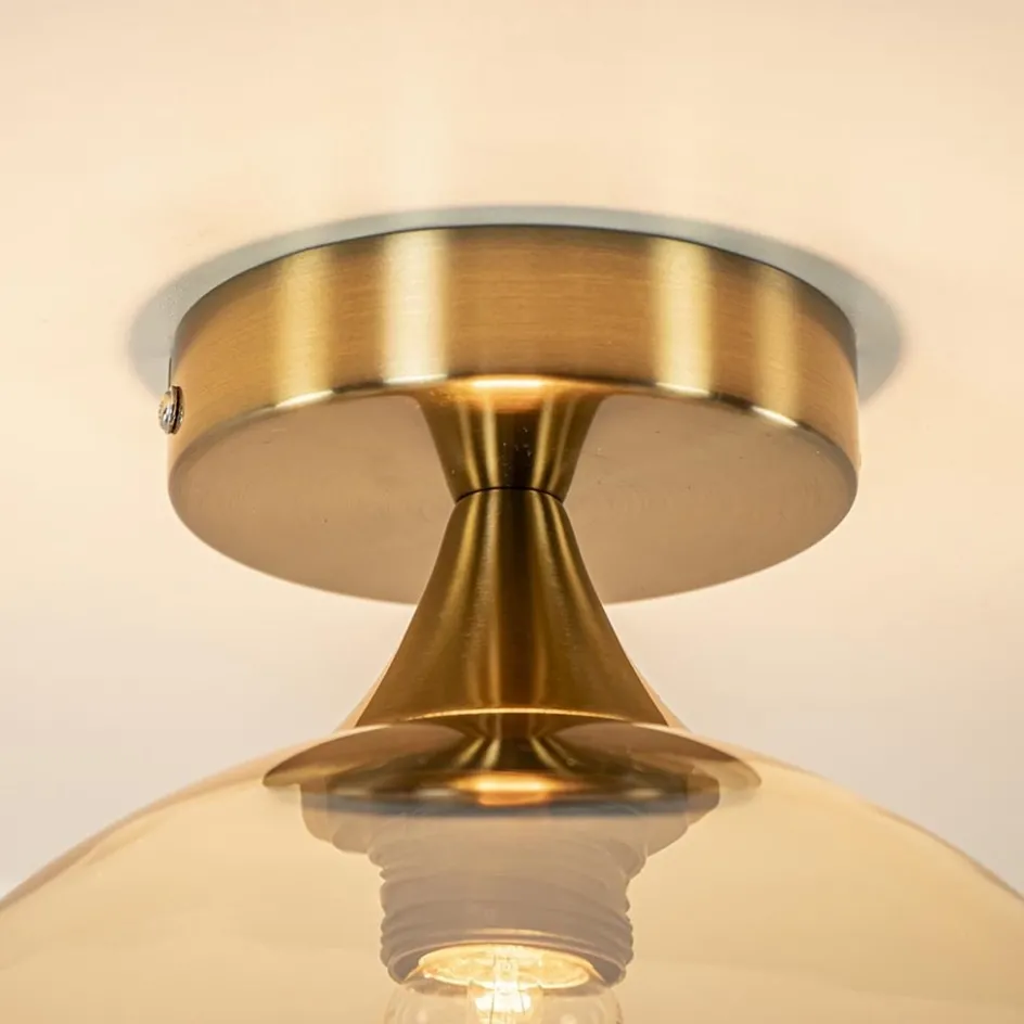 Ronde plafondlamp goud met amber glas>Straluma Discount