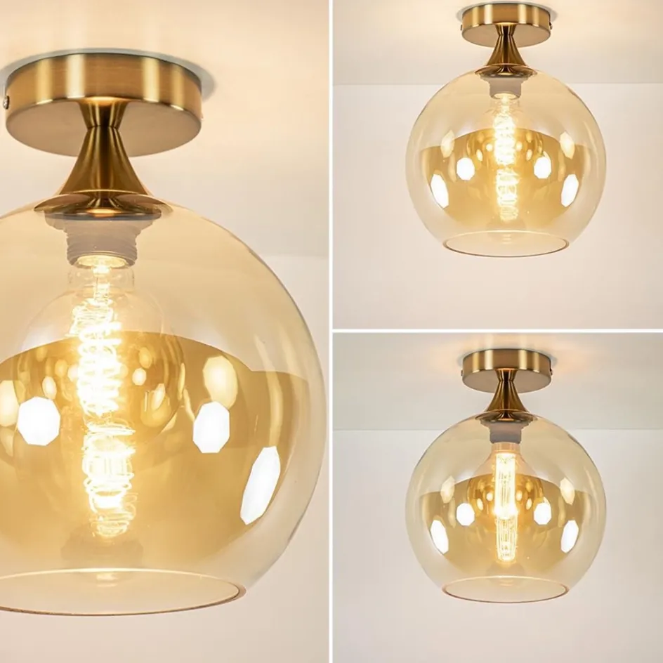 Ronde plafondlamp goud met amber glas>Straluma Discount