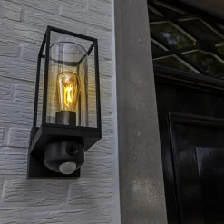Zwarte buitenlamp rechthoek met glas en camera><noscript><img width=